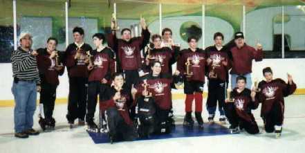 My championship Bantam Hs team.  I'm in front with the big pads, and my brother is third from the left, in the back row.  He's watching our goofy teammate. :)